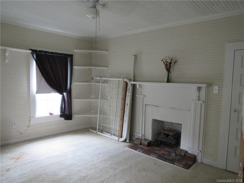 6737 Shiloh Unity Road Lancaster, SC 29720 - Photo 17 of 33 a view of a livingroom with a fireplace