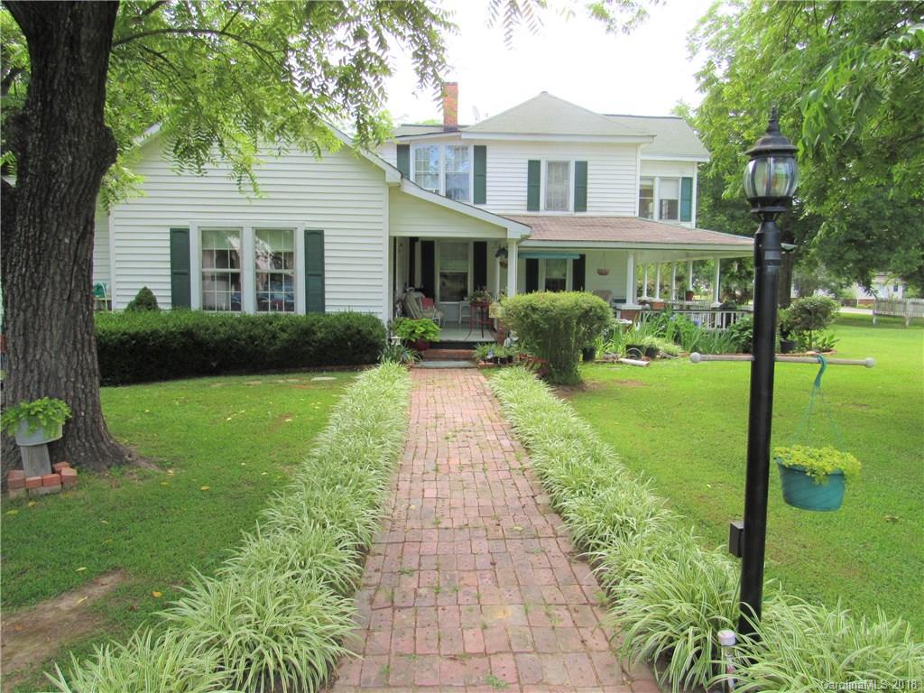 6737 Shiloh Unity Road Lancaster, SC 29720 - Photo 24 of 33 a front view of a house with garden