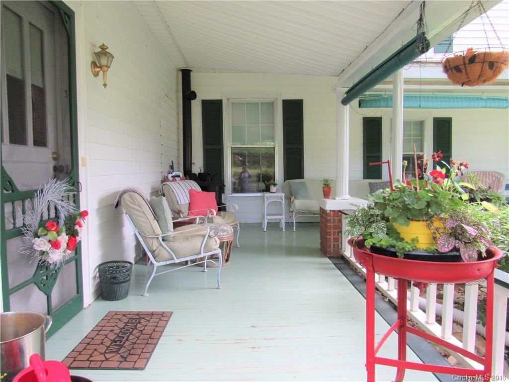 6737 Shiloh Unity Road Lancaster, SC 29720 - Photo 25 of 33 a balcony with furniture and flowers