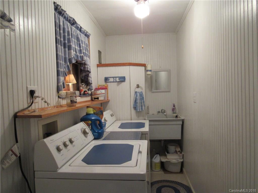 6737 Shiloh Unity Road Lancaster, SC 29720 - Photo 8 of 33 a bathroom with a sink and a mirror
