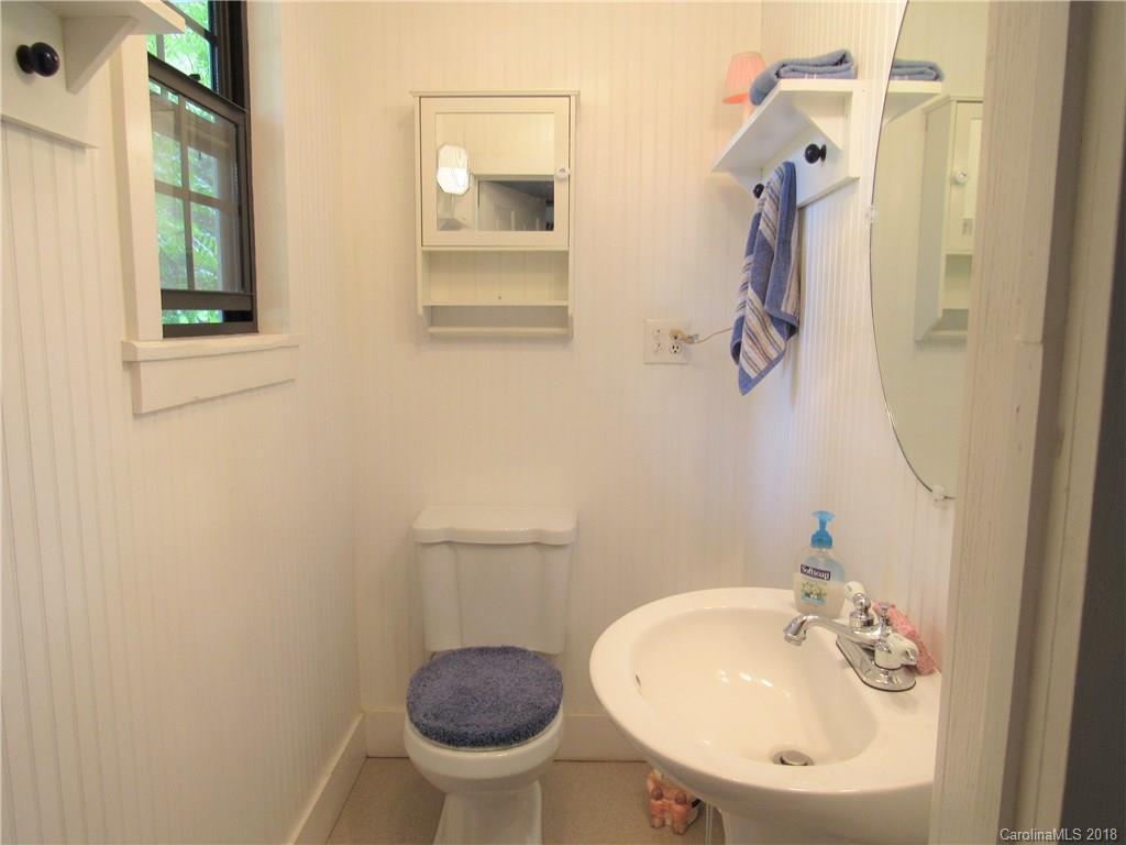 6737 Shiloh Unity Road Lancaster, SC 29720 - Photo 9 of 33 a bathroom with a sink and a mirror