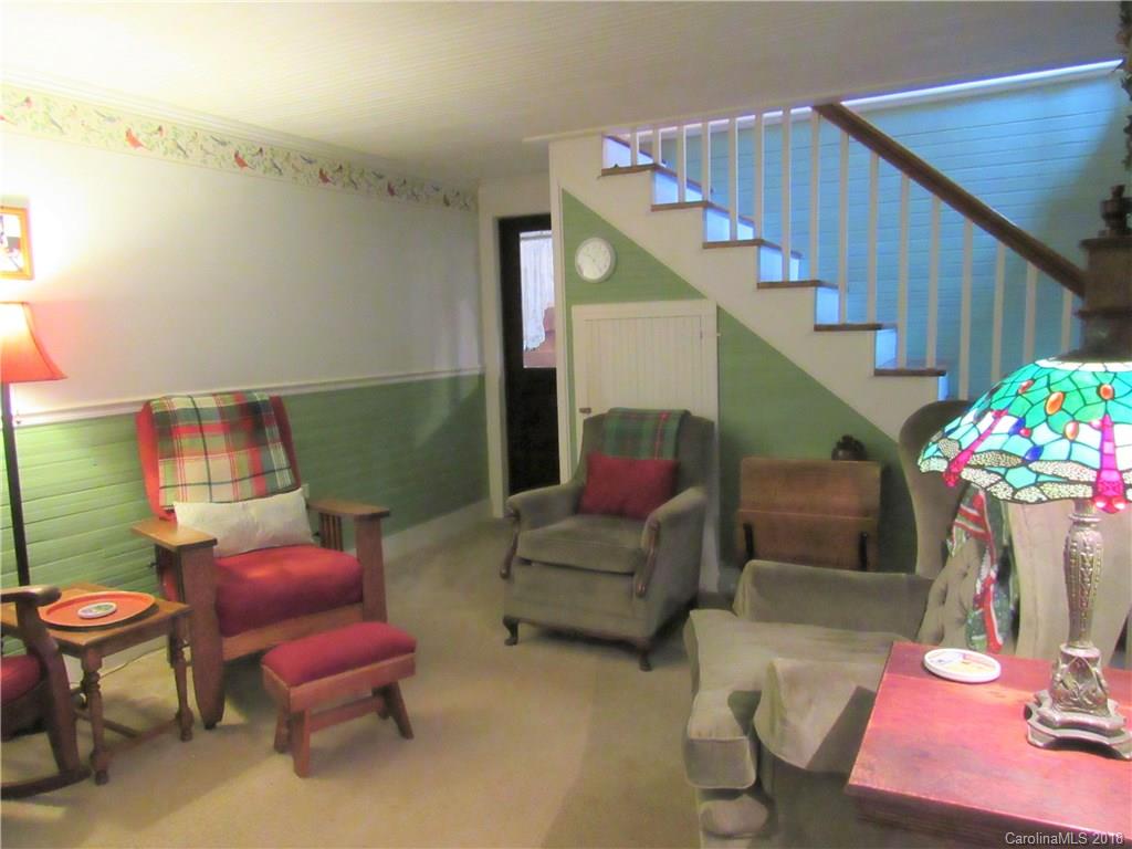 6737 Shiloh Unity Road Lancaster, SC 29720 - Photo 10 of 33 a living room with furniture and wooden floor