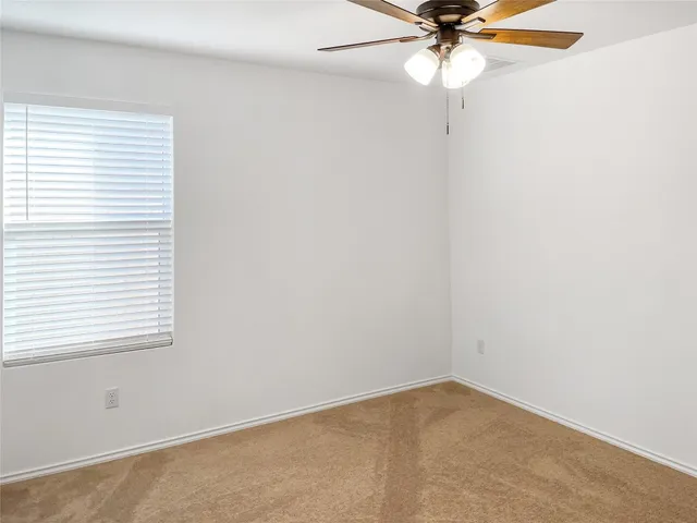 a bathroom with a toilet and sink