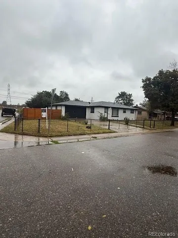 a view of street with large trees