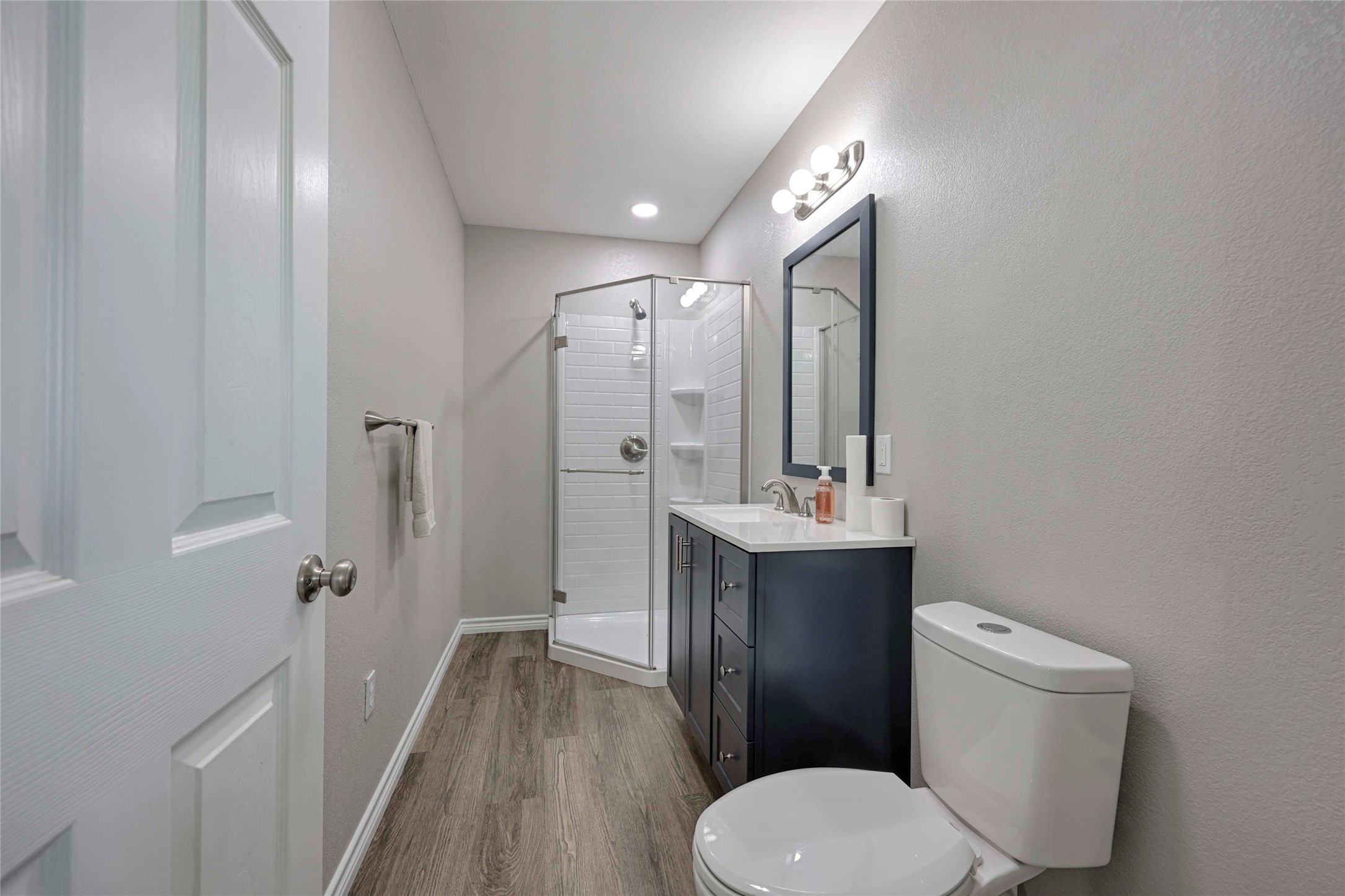3545 East I- 10 Frontage Road Schulenburg, TX 78956 - Photo 32 of 40 a bathroom with a toilet a sink and mirror