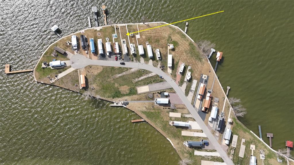 6454 Peninsula Road Kerens, TX 75144 - Photo 6 of 40 a view of staircase with wooden floor