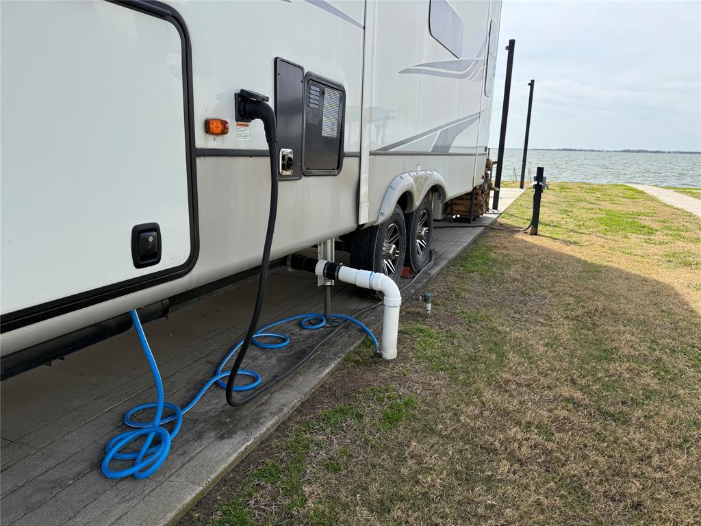 6454 Peninsula Road Kerens, TX 75144 - Photo 9 of 40 a view of a room with gym equipment