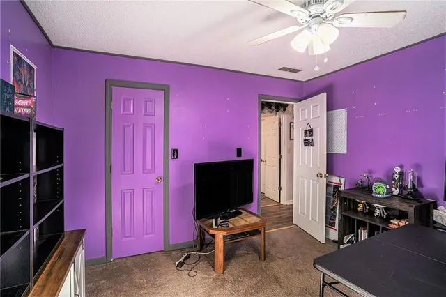 a bathroom with a sink toilet and mirror