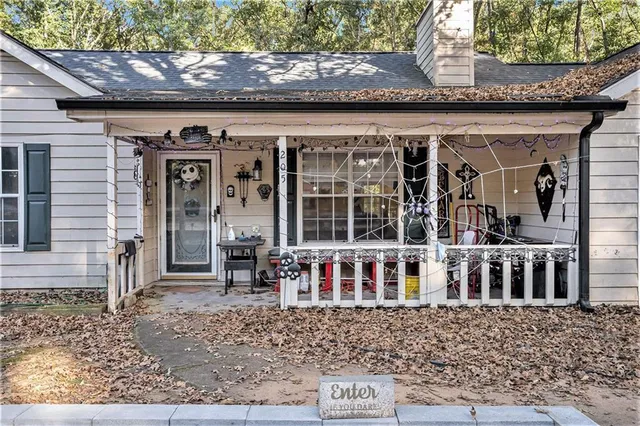 a front view of a building with glass windows