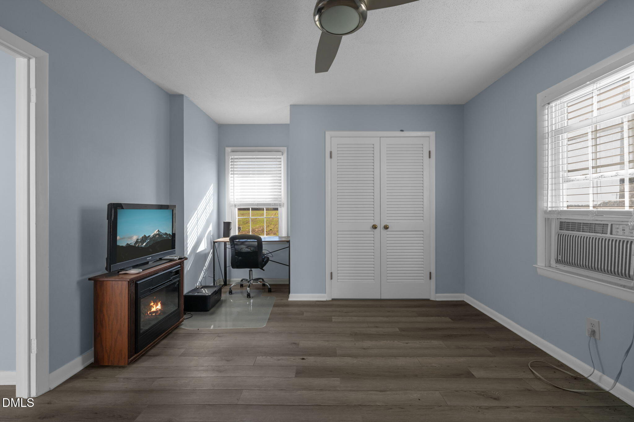 401 Allens Crossroads Road Four Oaks, NC 27524 - Photo 25 of 64 a view of a livingroom with wooden floor and furniture