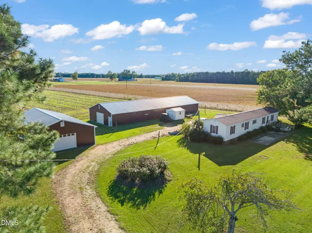 a view of a house with a big yard