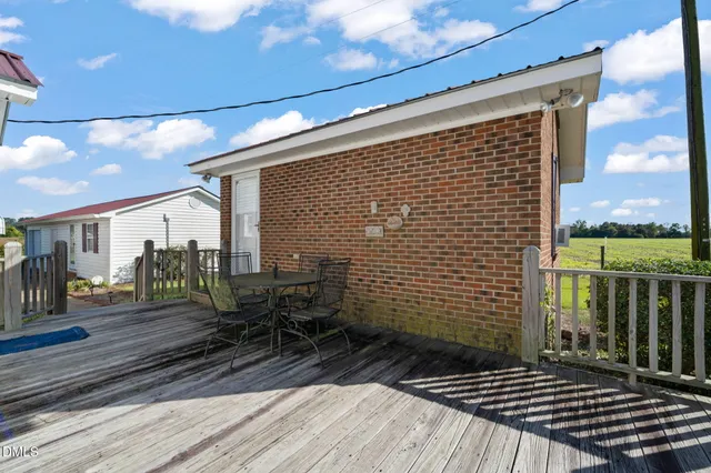a view of a back yard of the house