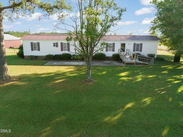 a view of pool with outdoor seating