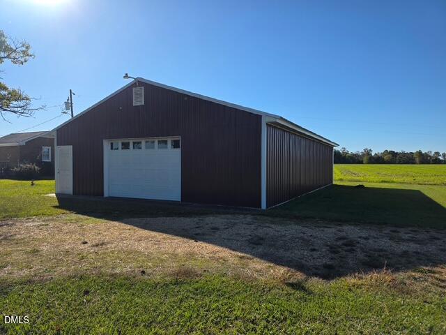 401 Allens Crossroads Road Four Oaks, NC 27524 - Photo 44 of 64 a front view of a house with a yard