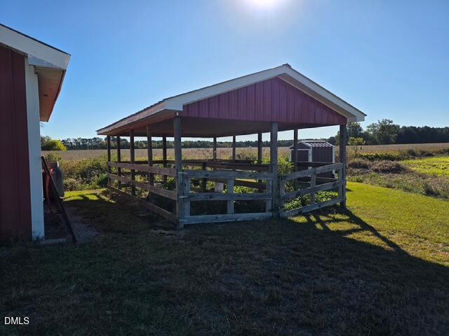 401 Allens Crossroads Road Four Oaks, NC 27524 - Photo 47 of 64 a view of a backyard with sitting area