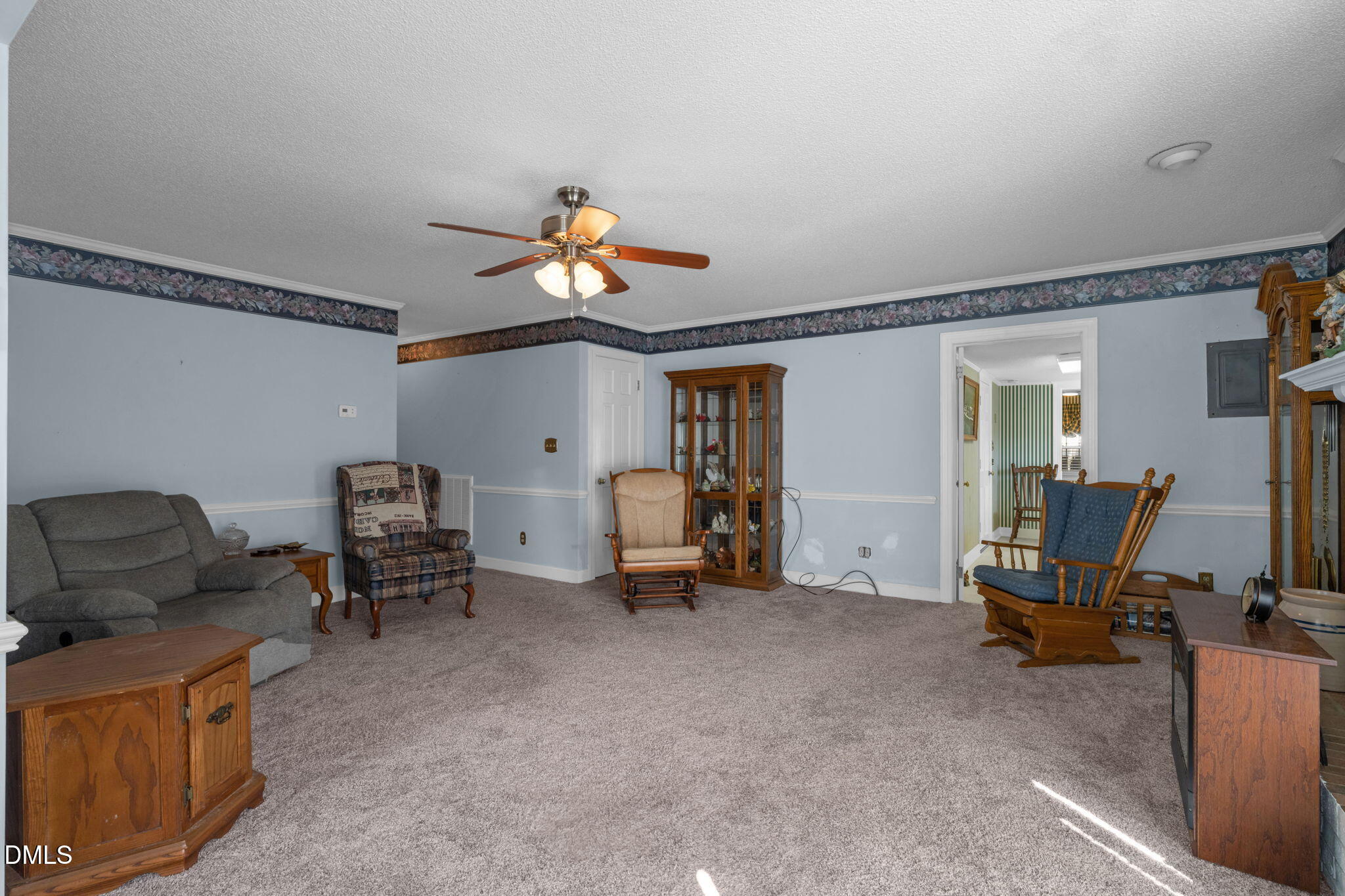 401 Allens Crossroads Road Four Oaks, NC 27524 - Photo 7 of 64 a view of a room with gym equipment