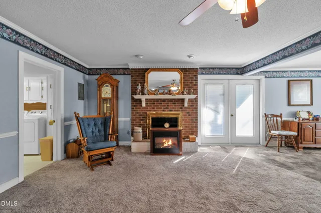 a kitchen with a stove a sink and a refrigerator