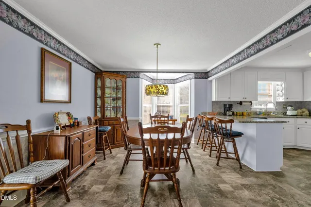 a view of a kitchen with cabinets