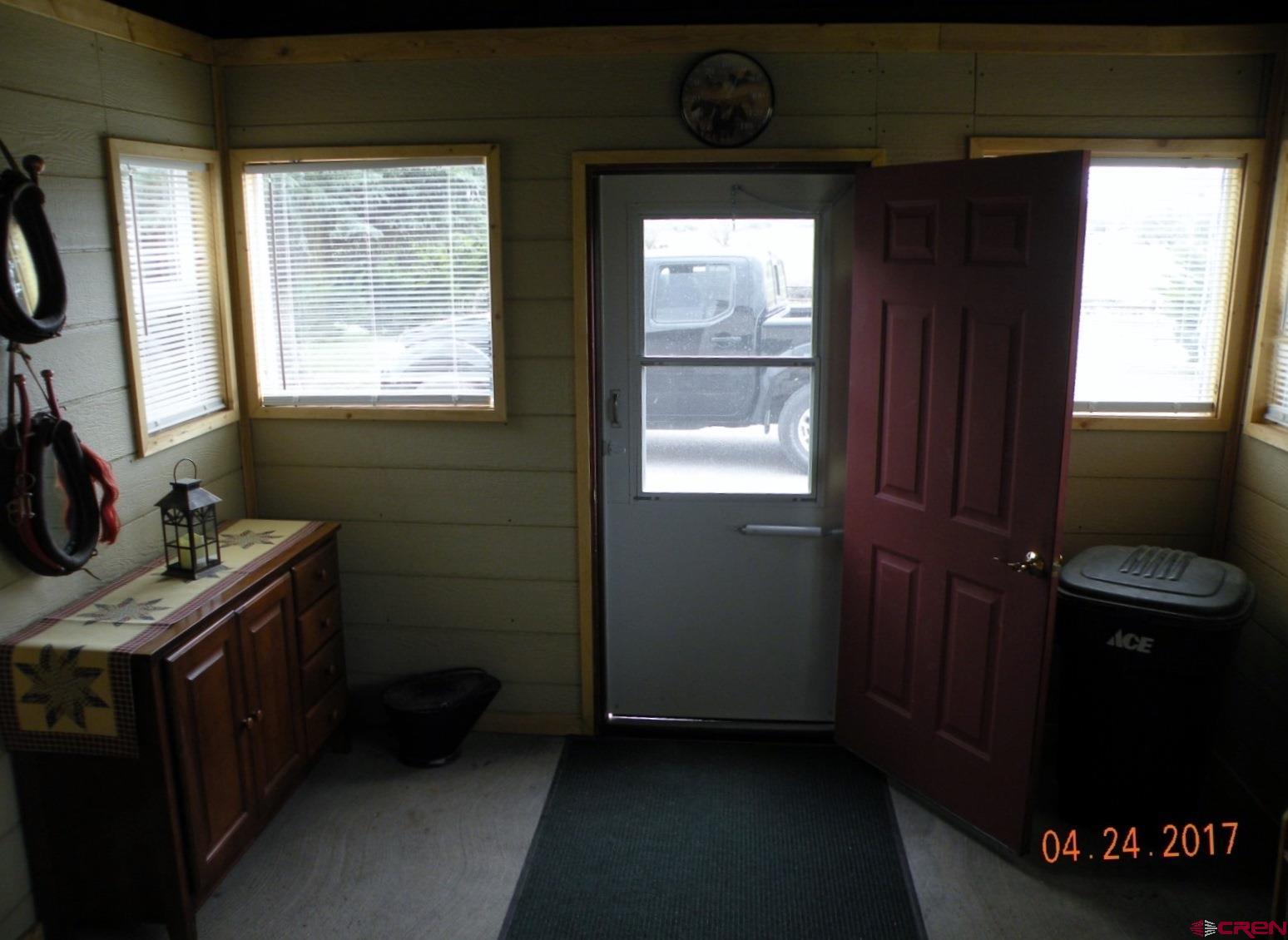 30146 DD31 Road Nucla, CO 81424 - Photo 13 of 25 a bathroom with a granite countertop sink a toilet and a window