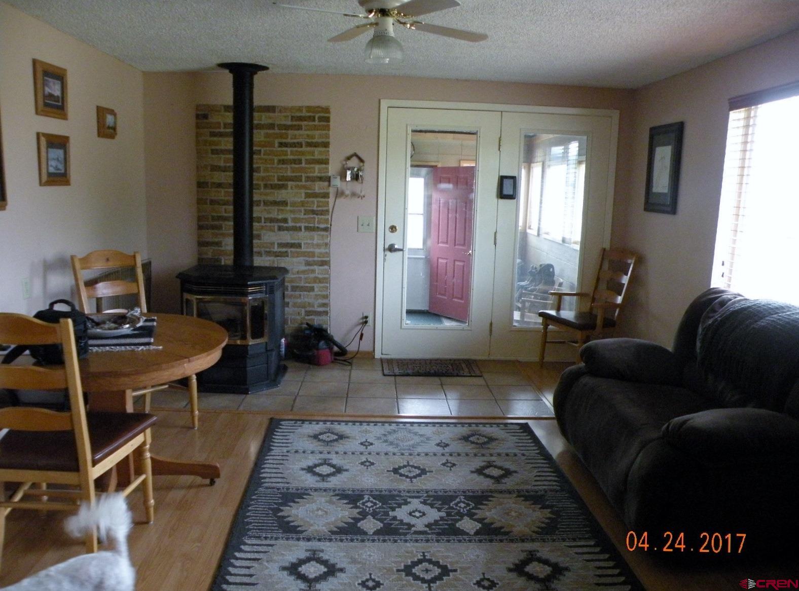 30146 DD31 Road Nucla, CO 81424 - Photo 14 of 25 a living room with furniture and a rug