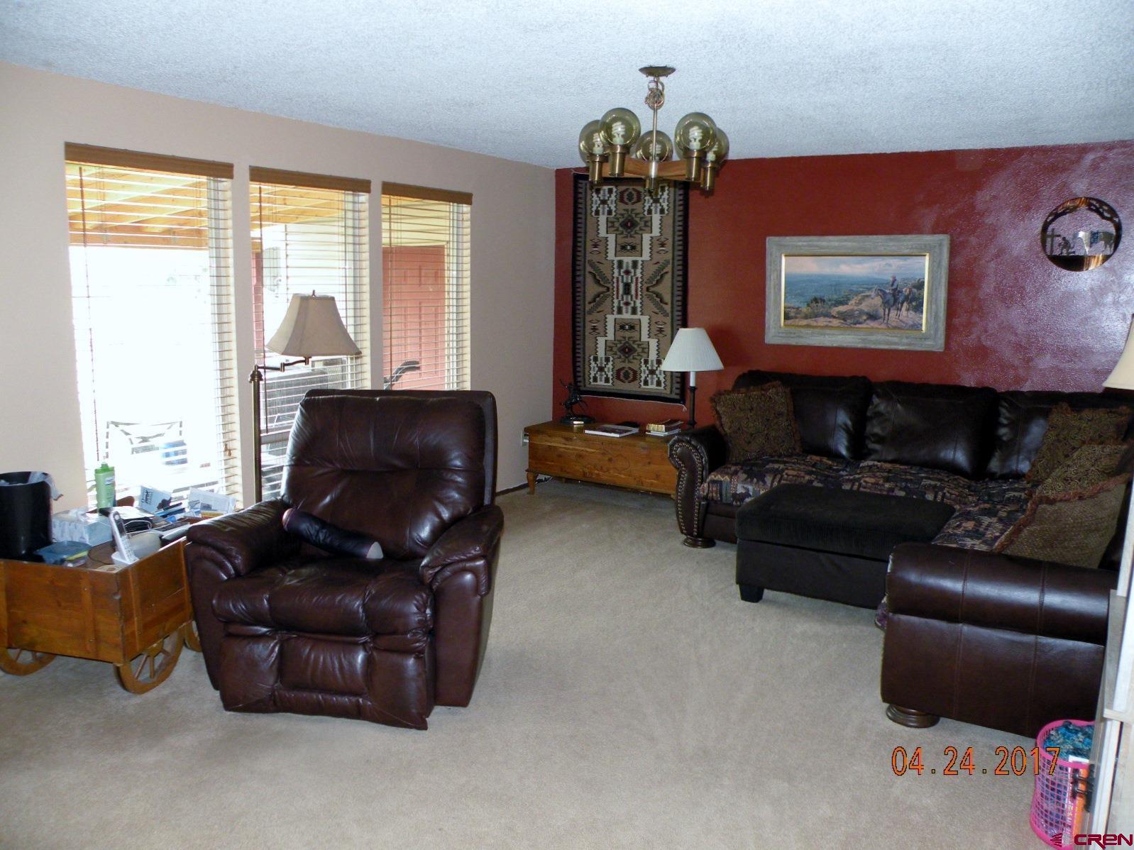 30146 DD31 Road Nucla, CO 81424 - Photo 17 of 25 a living room with furniture and a window