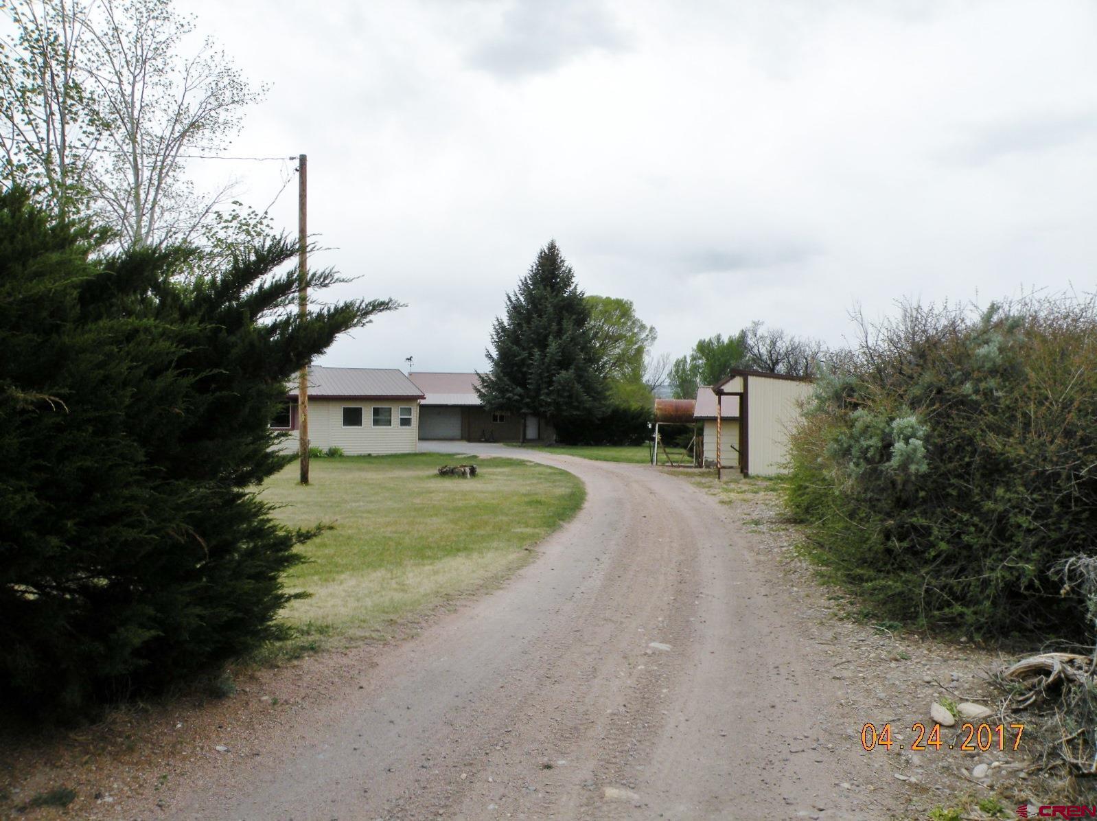 30146 DD31 Road Nucla, CO 81424 - Photo 7 of 25 a view of a street with a building in the background