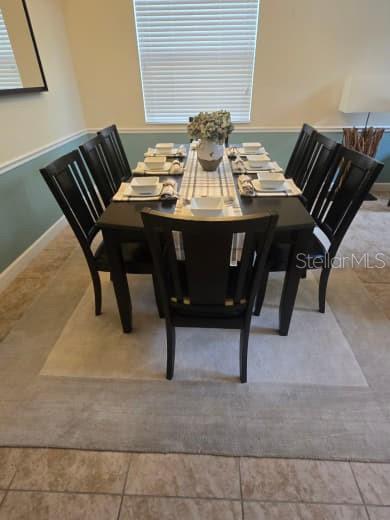 8923 Cuban Palm Road Kissimmee, FL 34747 - Photo 11 of 87 a view of a dining room with furniture