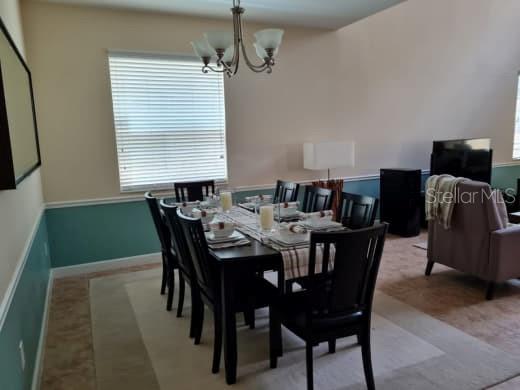 8923 Cuban Palm Road Kissimmee, FL 34747 - Photo 12 of 87 a view of a dining room with furniture