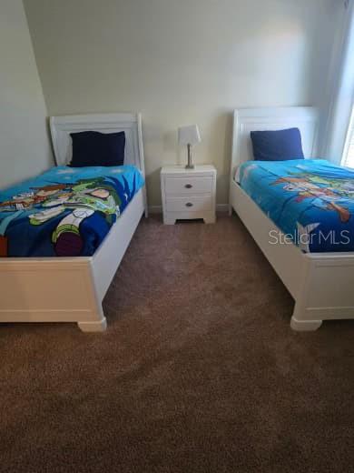 8923 Cuban Palm Road Kissimmee, FL 34747 - Photo 25 of 87 a bedroom with a bed and window