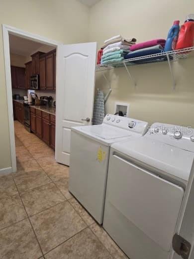 8923 Cuban Palm Road Kissimmee, FL 34747 - Photo 42 of 87 a utility room with dryer and washer