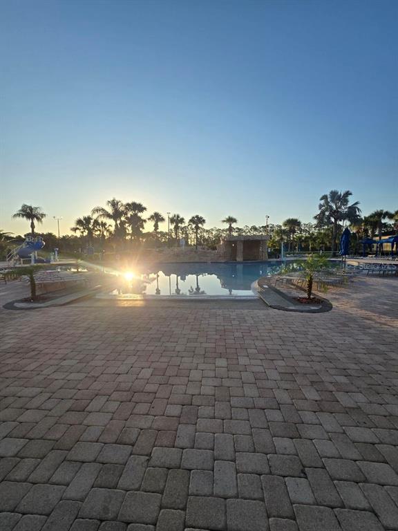 8923 Cuban Palm Road Kissimmee, FL 34747 - Photo 51 of 87 a view of a lake with a city