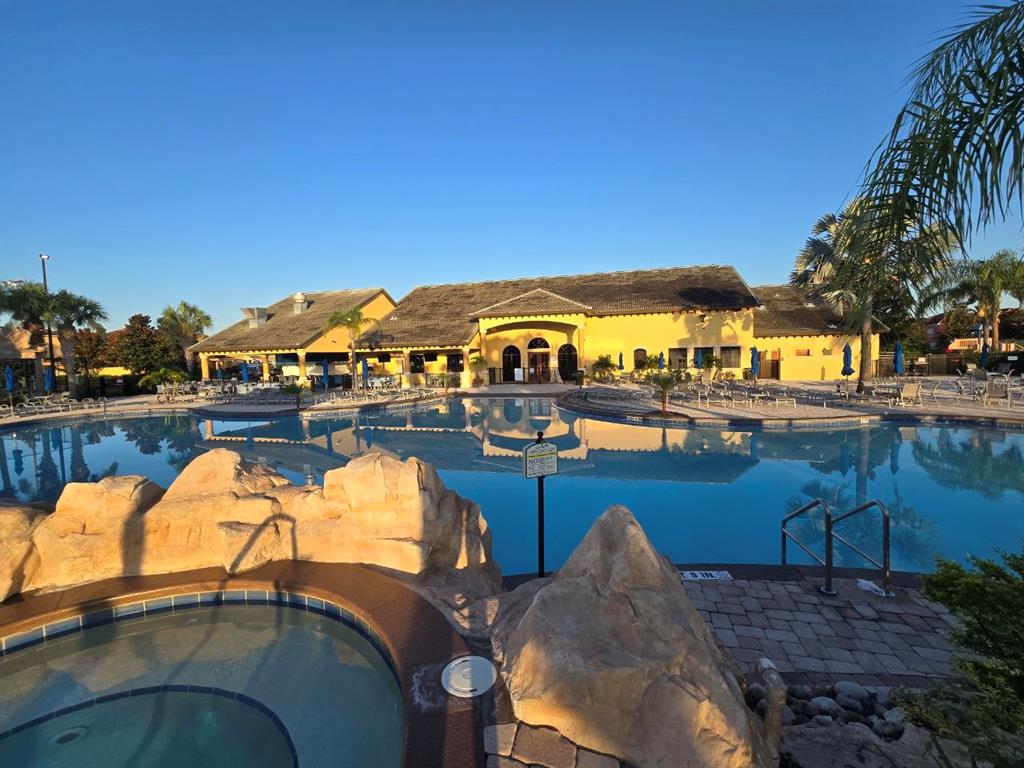 8923 Cuban Palm Road Kissimmee, FL 34747 - Photo 65 of 87 a view of a lake with couches and city view