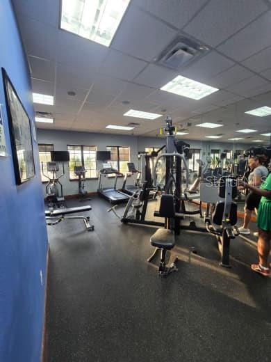 8923 Cuban Palm Road Kissimmee, FL 34747 - Photo 71 of 87 a view of a room with gym equipment