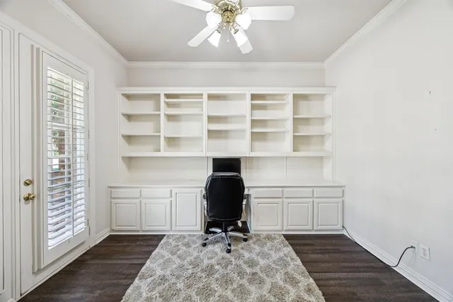 a workspace with furniture and a window