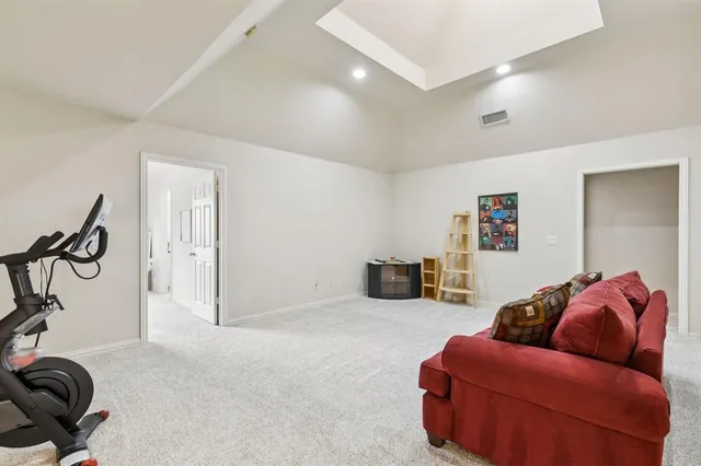 a livingroom with furniture and white walls