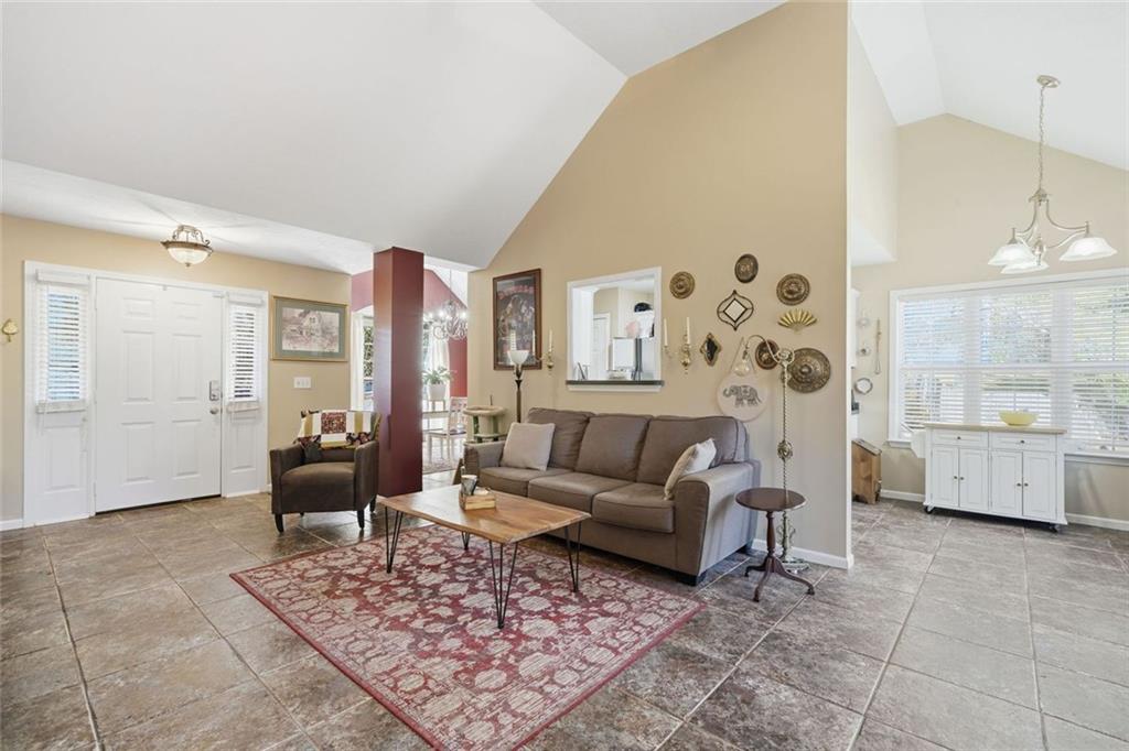 137 Orchard Way Southeast Calhoun, GA 30701 - Photo 12 of 37 a living room with furniture and a table