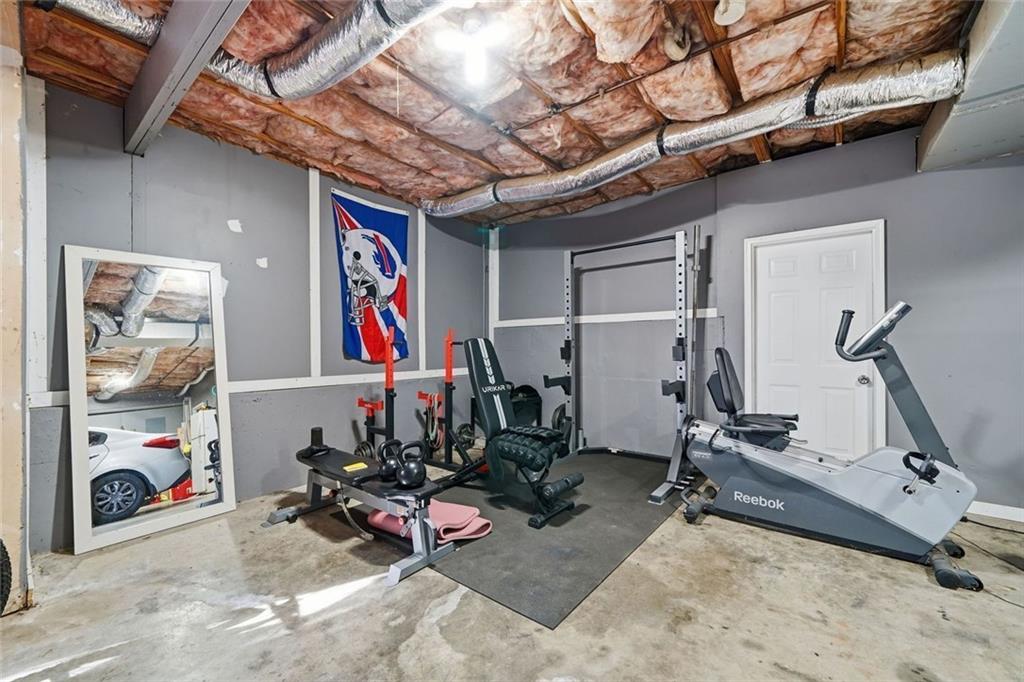 137 Orchard Way Southeast Calhoun, GA 30701 - Photo 26 of 37 a view of a room with gym equipment
