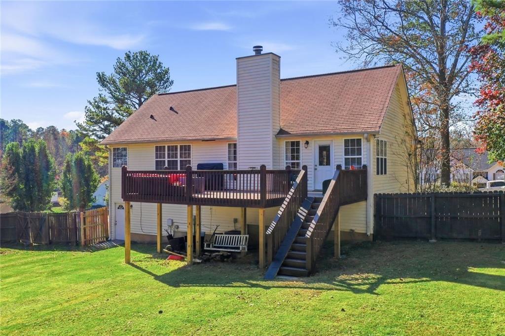 137 Orchard Way Southeast Calhoun, GA 30701 - Photo 31 of 37 a view of a house with a backyard and a slide