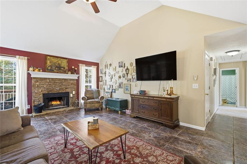 137 Orchard Way Southeast Calhoun, GA 30701 - Photo 8 of 37 a living room with furniture and a flat screen tv