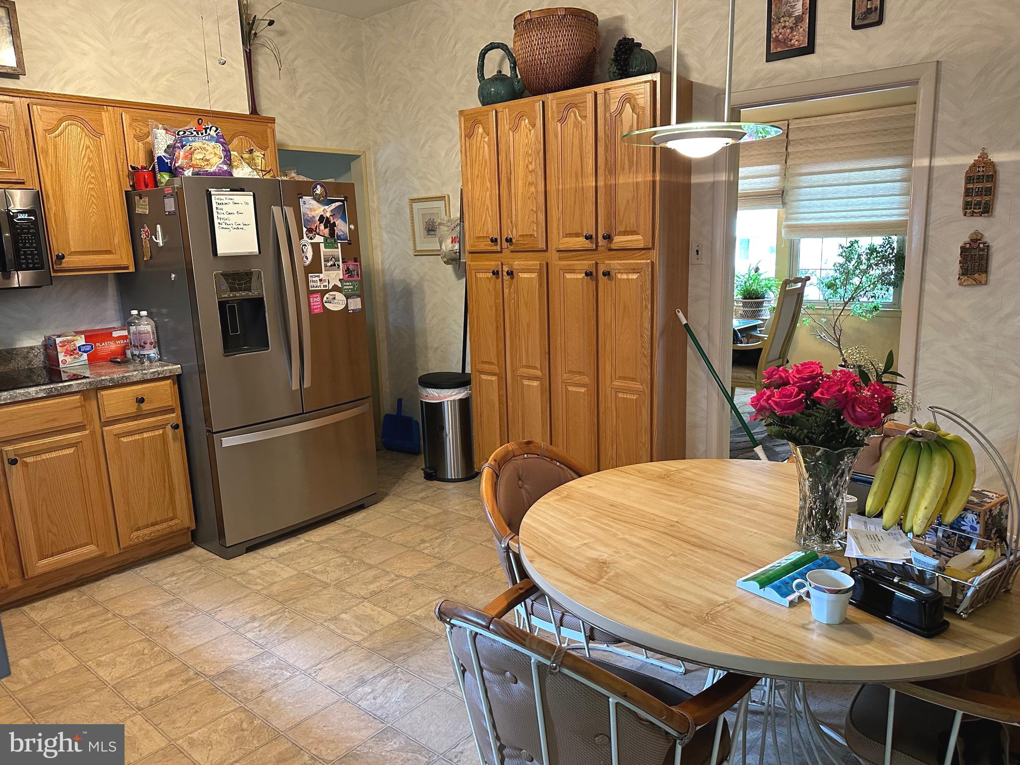 901 Kingston Drive Cherry Hill, NJ 08034 - Photo 13 of 30 a dining room with furniture and chandelier