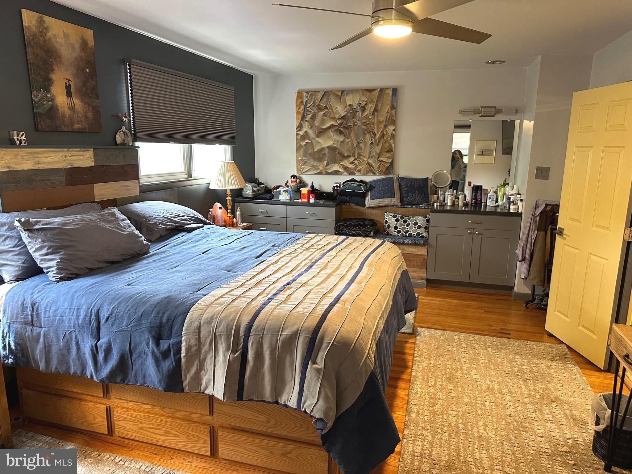 901 Kingston Drive Cherry Hill, NJ 08034 - Photo 16 of 30 a bedroom with a bed and wooden floor