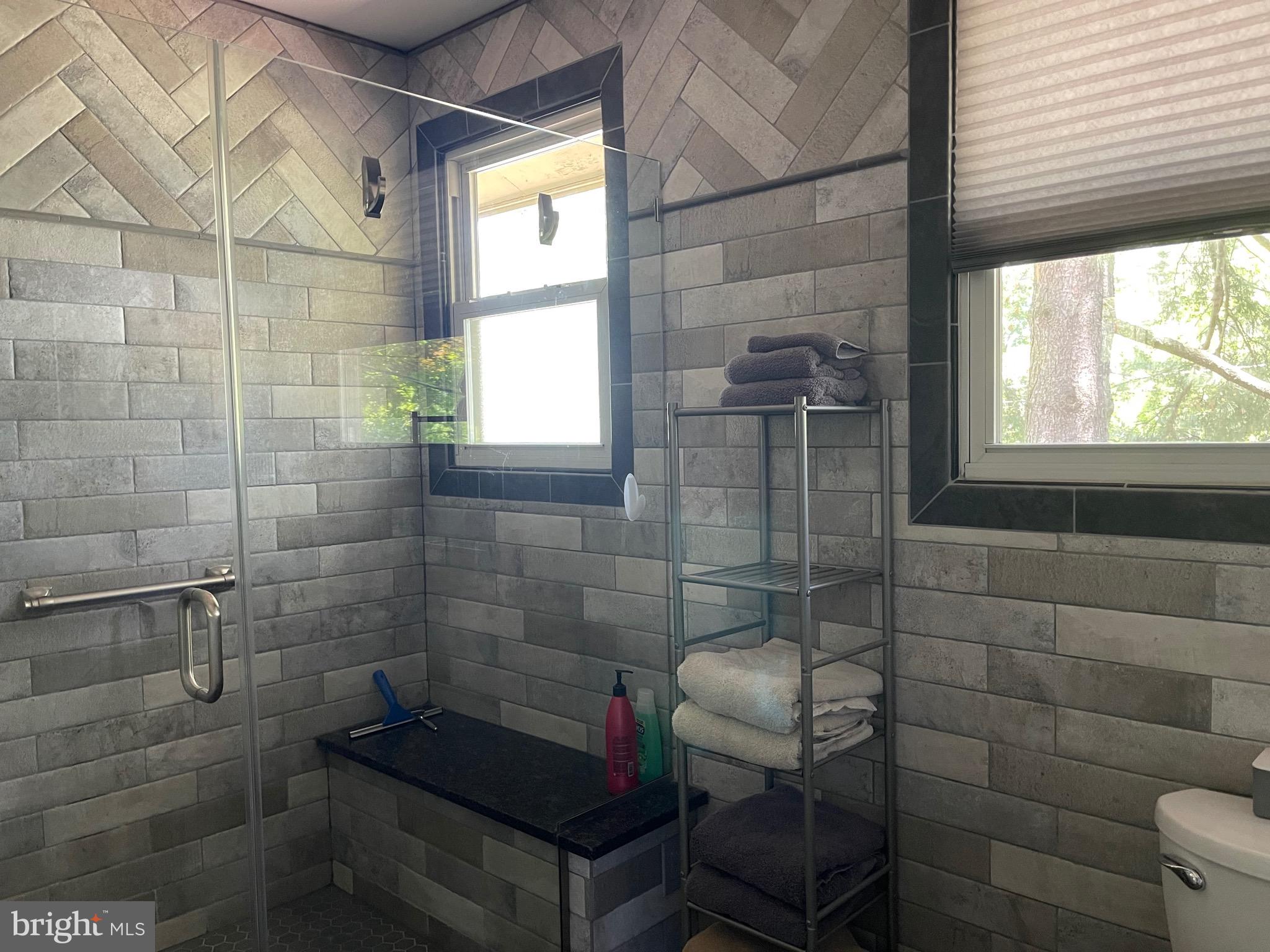 901 Kingston Drive Cherry Hill, NJ 08034 - Photo 21 of 30 a bathroom with a sink toilet and shower