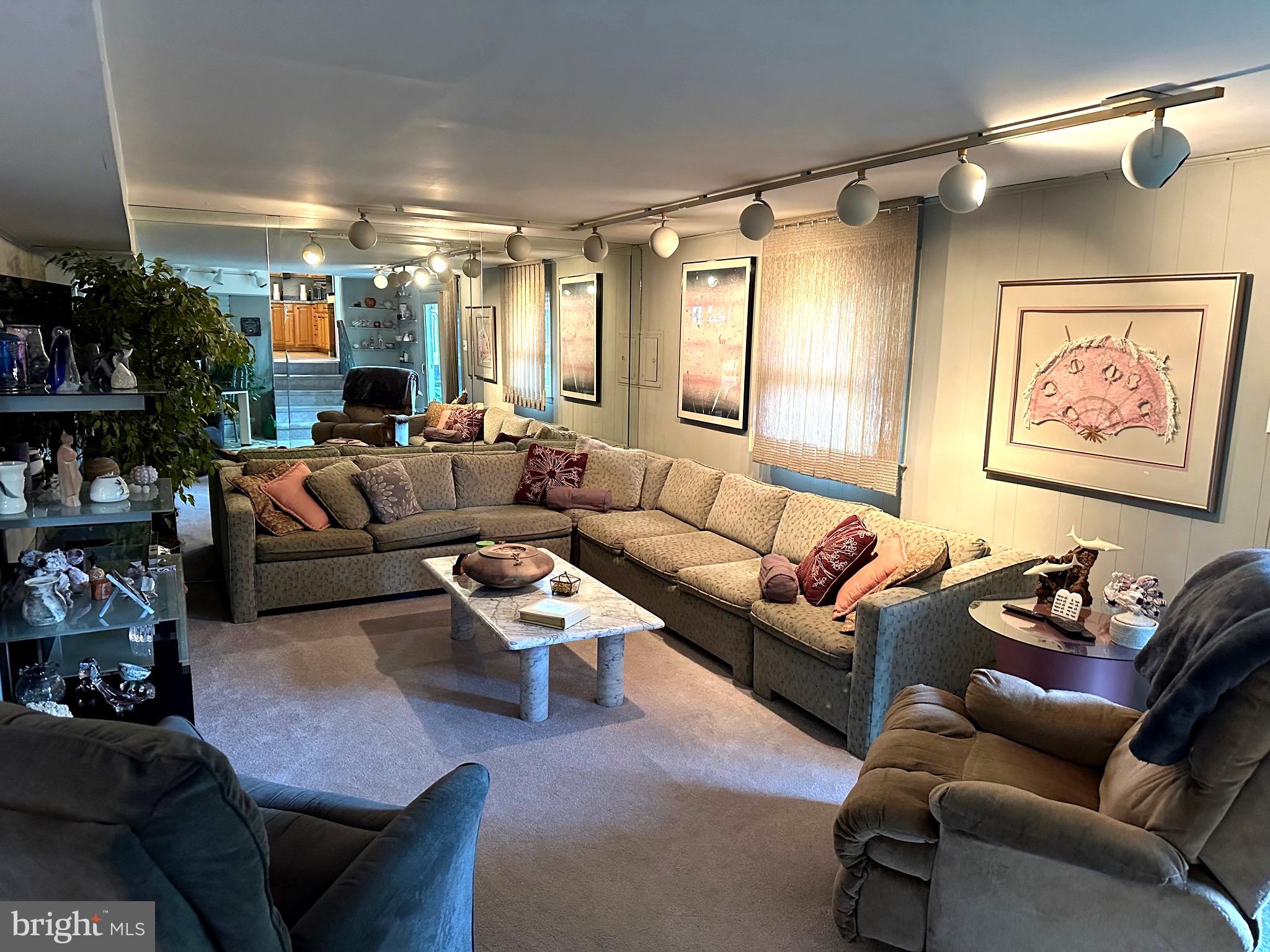 901 Kingston Drive Cherry Hill, NJ 08034 - Photo 6 of 30 a living room with furniture and a fireplace
