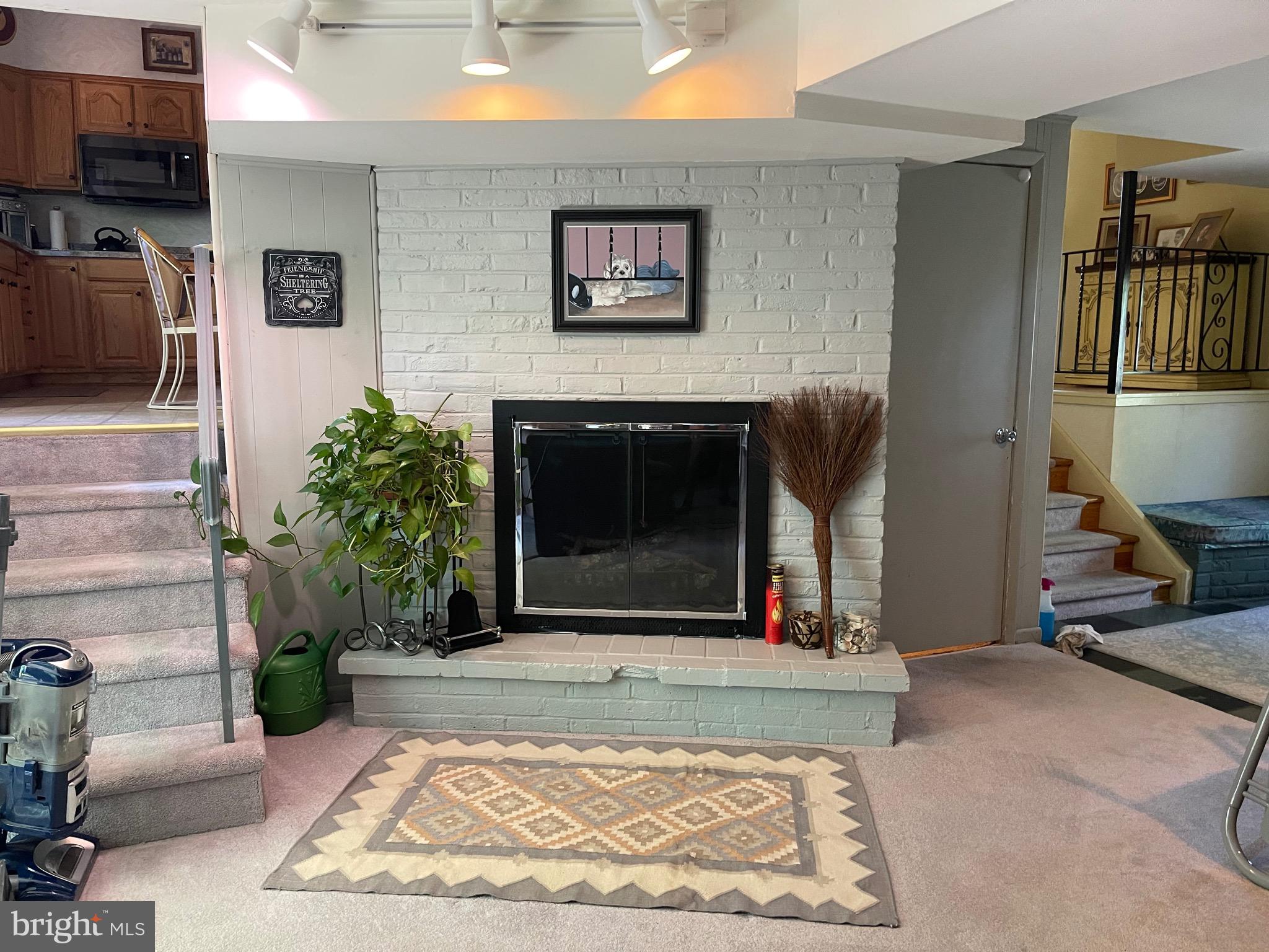 901 Kingston Drive Cherry Hill, NJ 08034 - Photo 8 of 30 a living room with furniture and a fireplace
