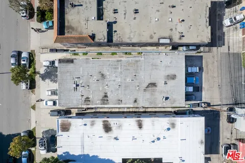 a picture of a building with a white wall