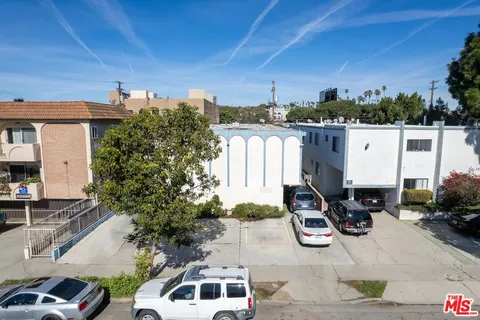 a car parked in front of a house