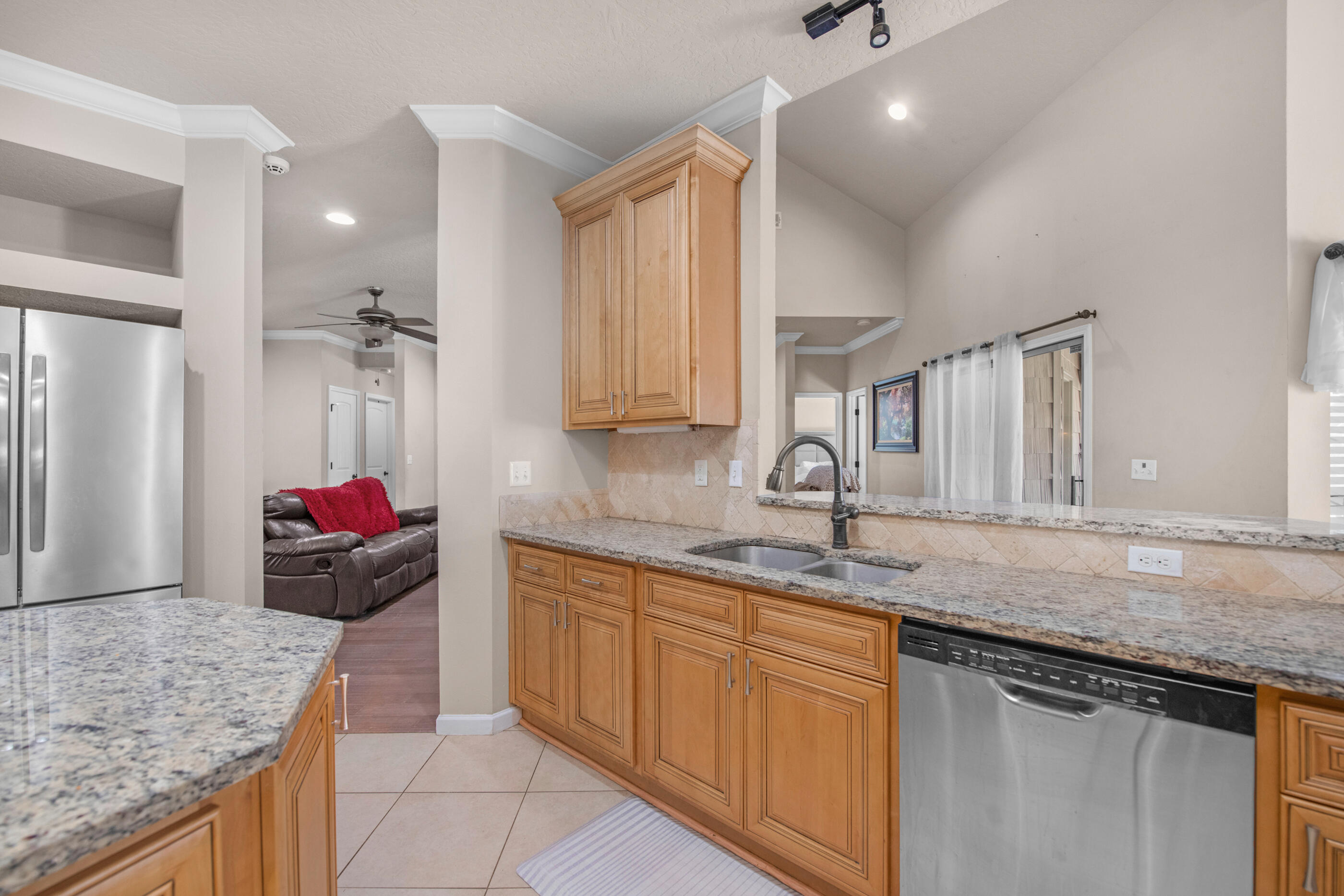 4537 Annabelle Lane Crestview, FL 32539 - Photo 16 of 41 a kitchen with a sink and cabinets
