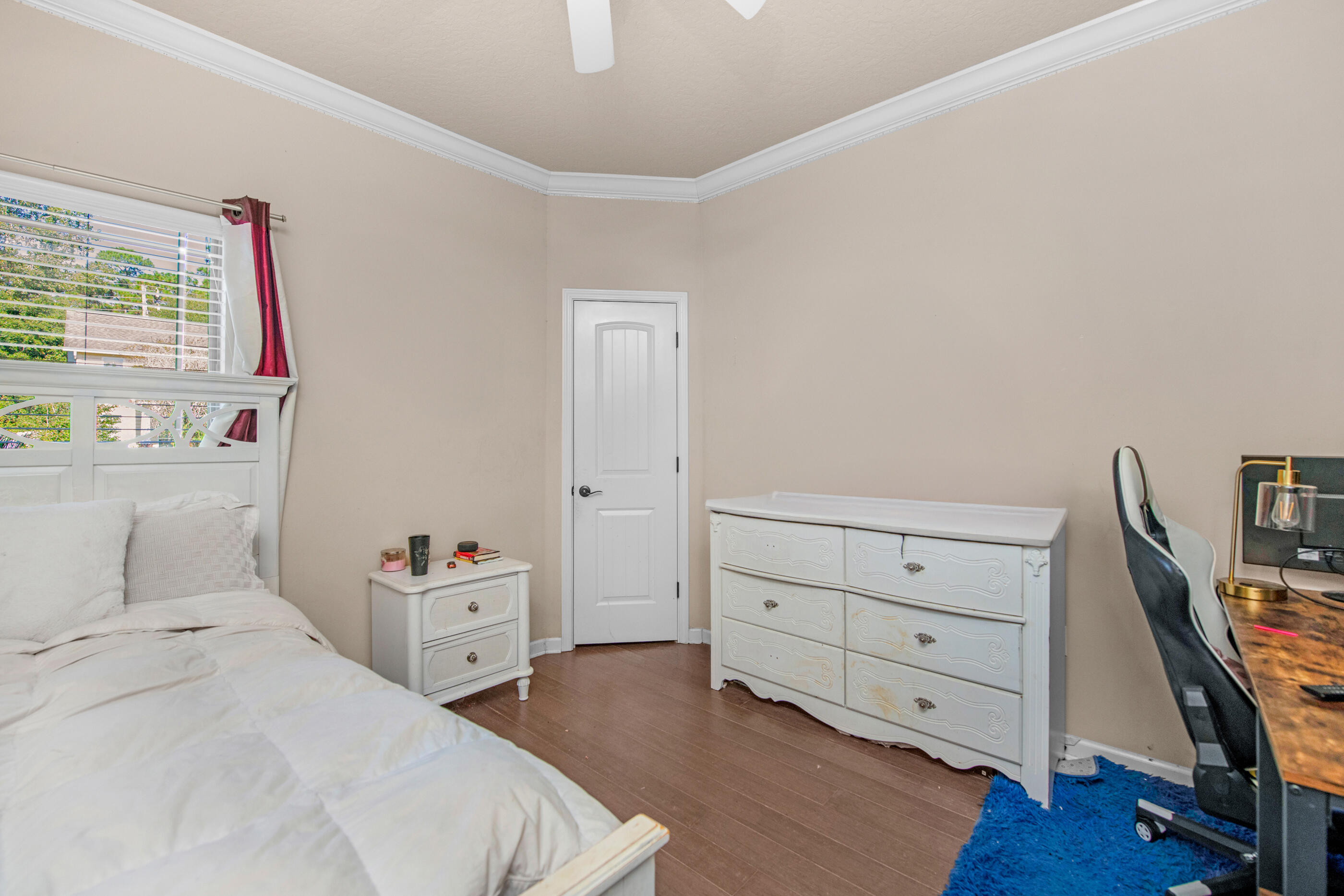 4537 Annabelle Lane Crestview, FL 32539 - Photo 18 of 41 a bedroom with a bed and a dresser