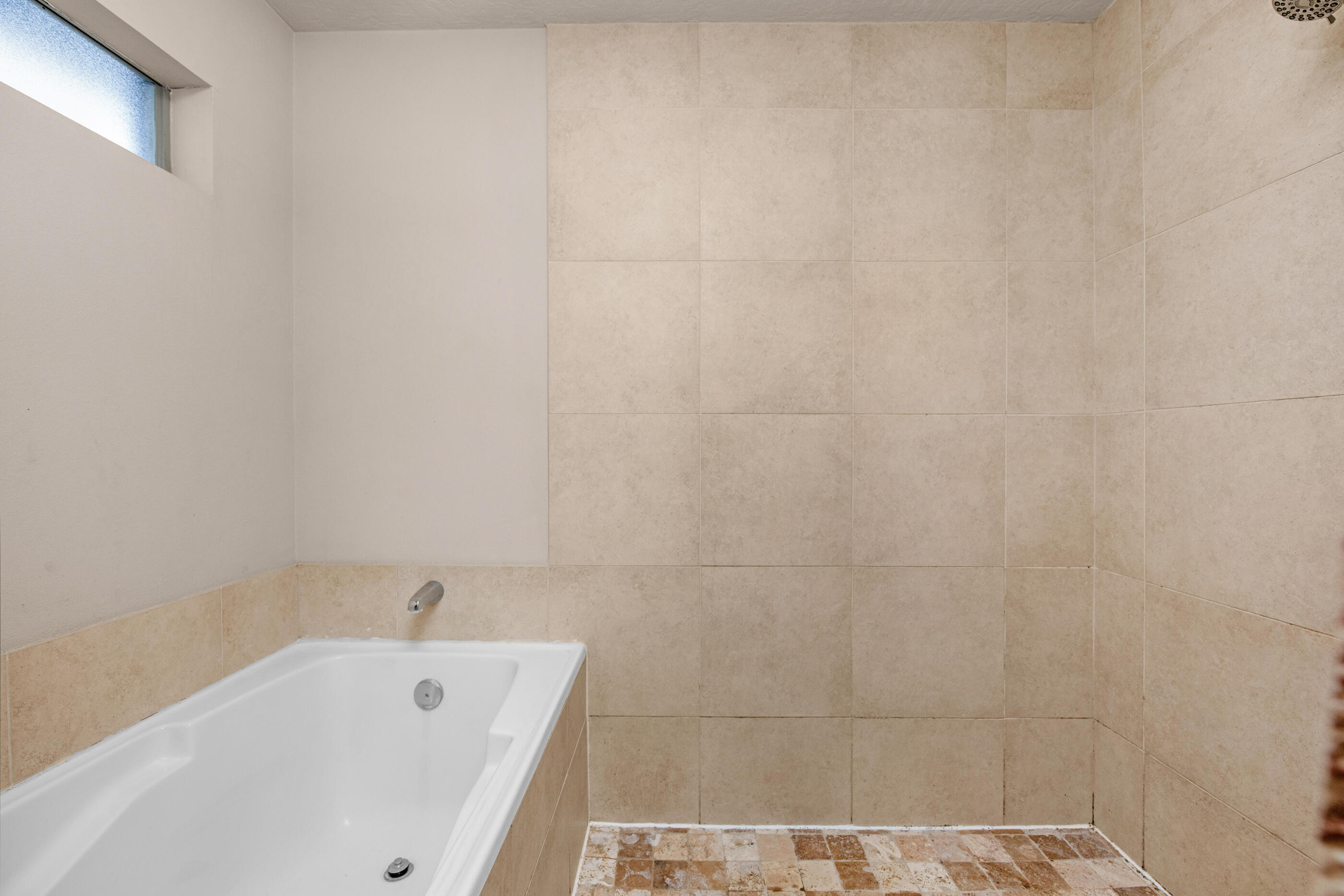 4537 Annabelle Lane Crestview, FL 32539 - Photo 30 of 41 a bathroom with a tub and a shower