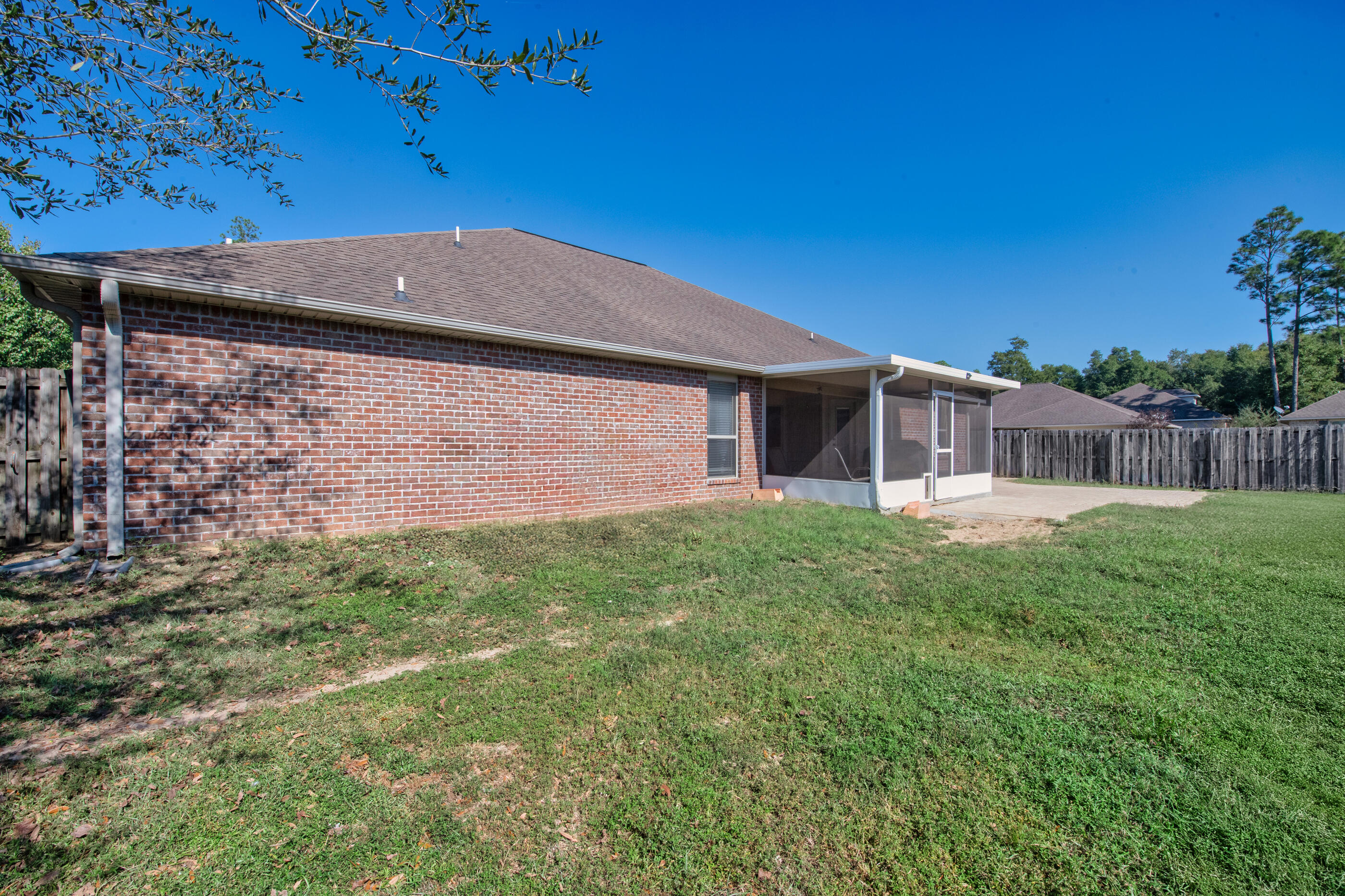 4537 Annabelle Lane Crestview, FL 32539 - Photo 38 of 41 a front view of a house with garden